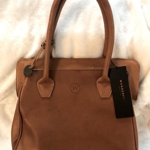 Monte Carlo hand bag by Wanderers Travel Co. Bag